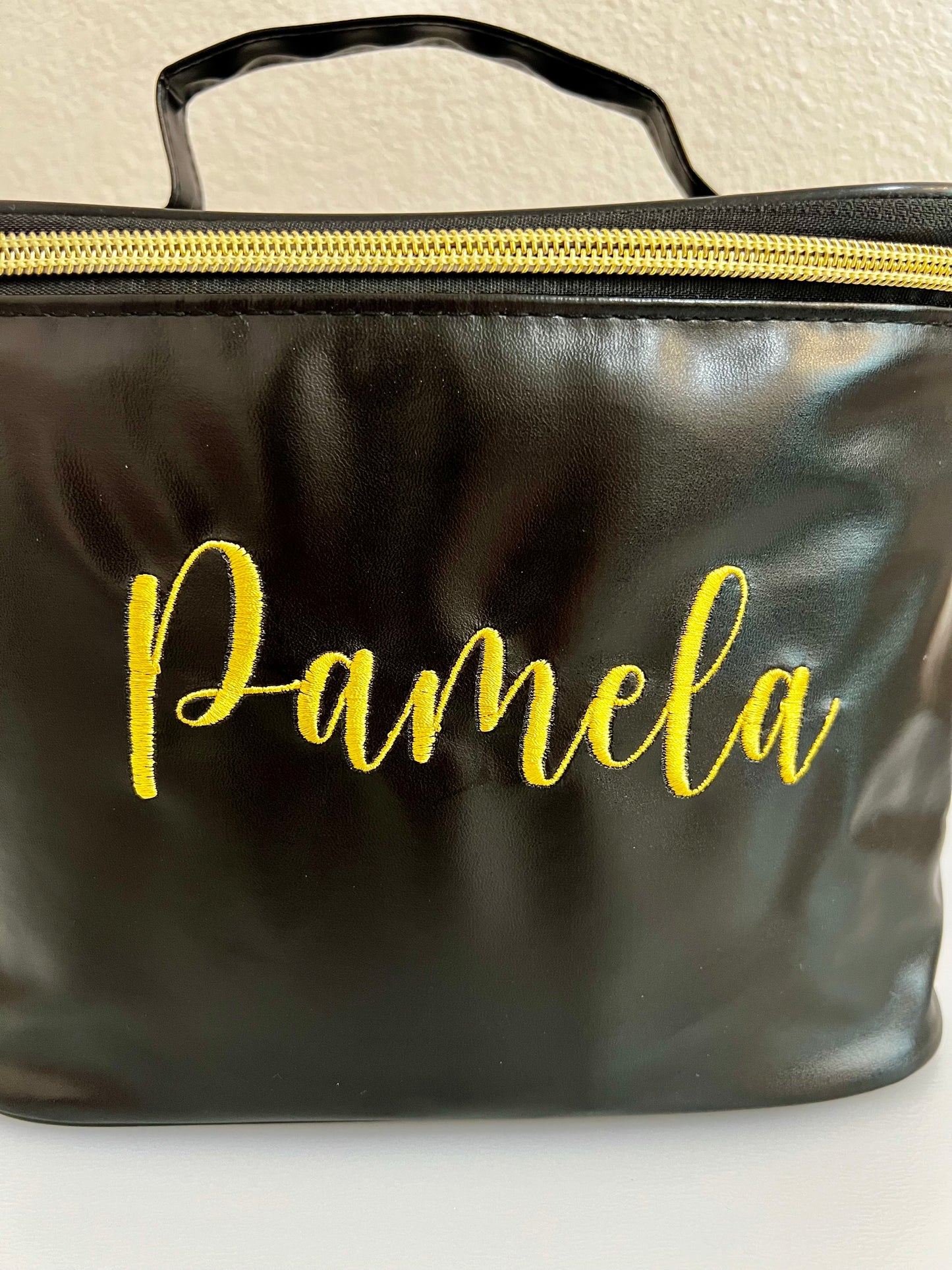 Embroidered make up bag