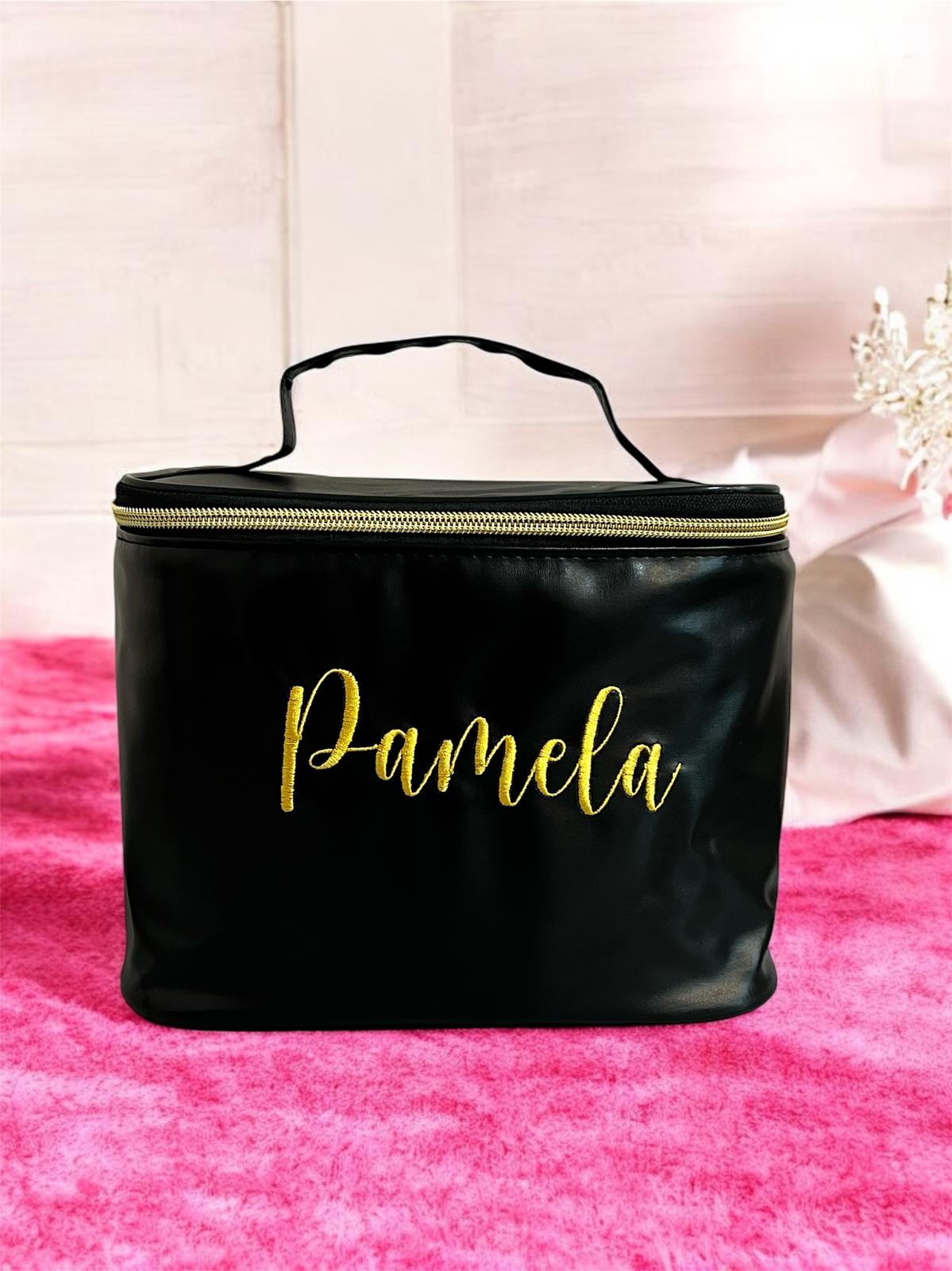 Embroidered make up bag